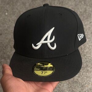 New Era Black Cap with White Embroidered Logo